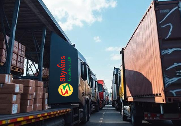 Freight vehicles and goods at a loading area